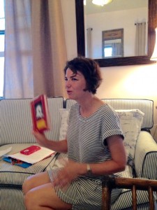 Author Cathy Hankla holding her book at Nimrod Hall Writers' Workshop