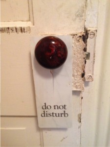 "Do not disturb" sign on door knob