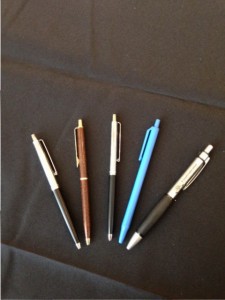 photo of pens on table at Suffolk Mystery Authors Festival