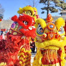 This image has an empty alt attribute; its file name is lion-dance.jpg